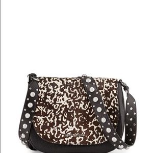 Michael Kors heyes messenger